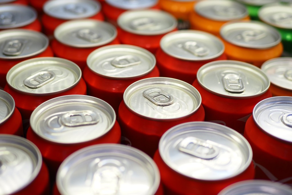 cans-of-soft-drink-lined-up-2023-11-27-05-05-44-utc.jpg